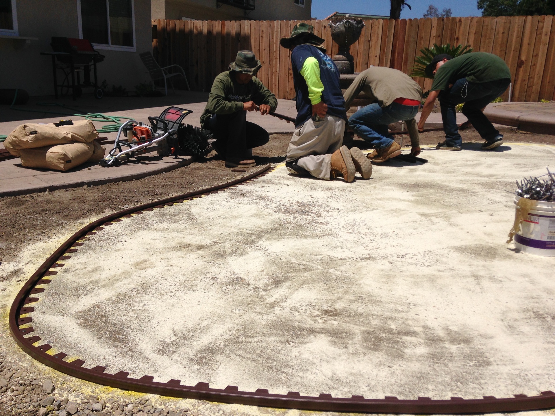 NoMow Turf crew prepping the base for a new install